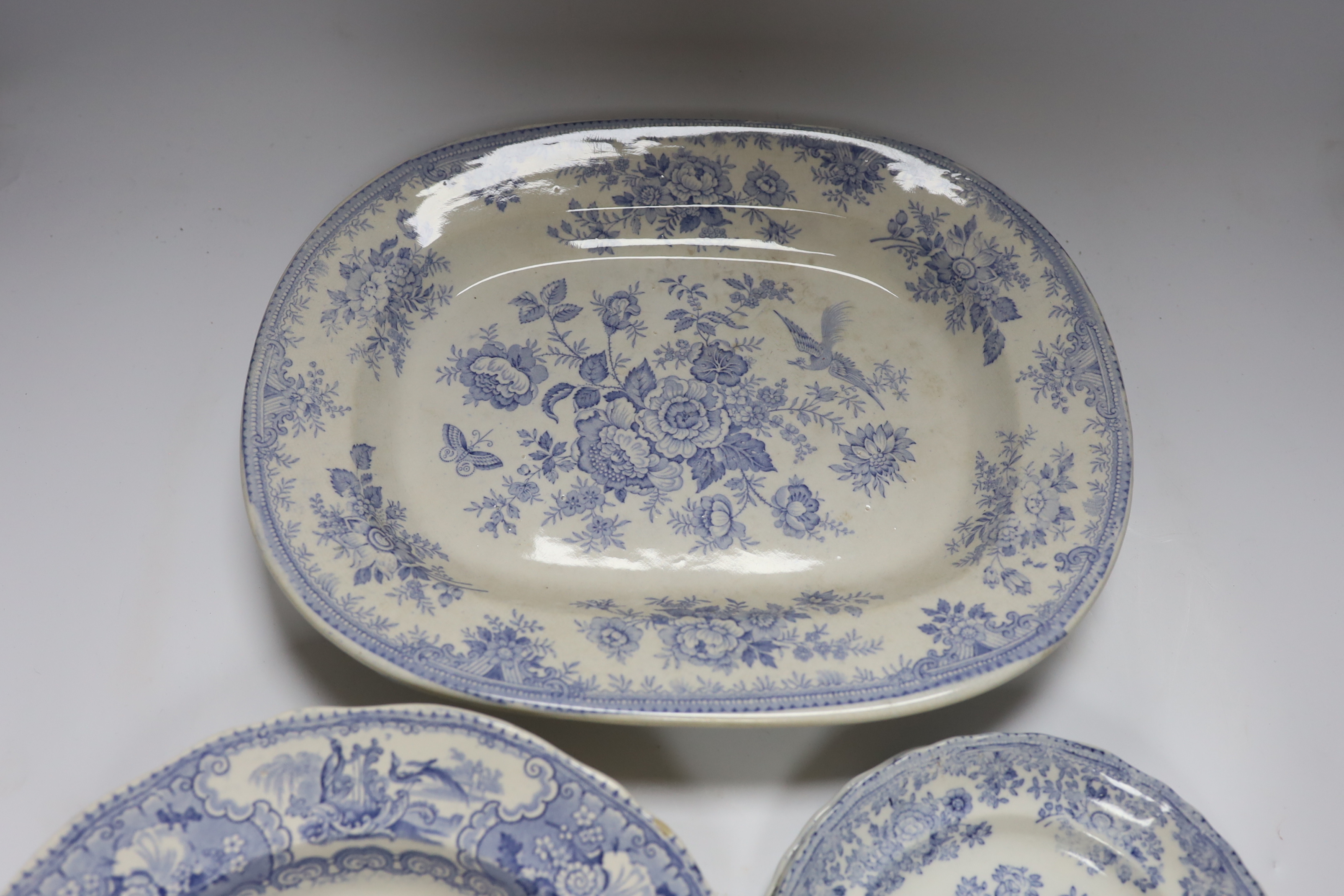 A collection of 19th century Staffordshire pottery blue and white dinner wares, (10 dishes in various sizes).